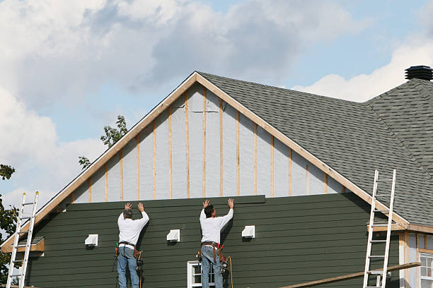 Professional Siding Installation technician working in Walpole, MA